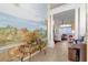 Elegant entryway with a hand-painted mural and high ceilings at 1676 Palace Ct, Punta Gorda, FL 33980