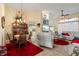 Bright dining room with seating for four and views into the living room at 1676 Palace Ct, Punta Gorda, FL 33980