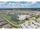 Community overview with clubhouse, pool, and golf course at 1676 Palace Ct, Punta Gorda, FL 33980