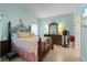 Spacious bedroom with a king-size bed and ensuite bathroom at 1676 Palace Ct, Punta Gorda, FL 33980