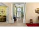 View through columns showcasing the home's grand entrance at 1676 Palace Ct, Punta Gorda, FL 33980