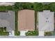 Directly above view of home roof and landscaping at 1676 Palace Ct, Punta Gorda, FL 33980
