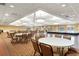 Large banquet hall with tables and chairs for events at 1676 Palace Ct, Punta Gorda, FL 33980