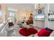 Spacious living room with comfortable seating and a large TV at 1676 Palace Ct, Punta Gorda, FL 33980