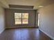 Bedroom with tile floors, ample natural light, and outdoor access at 14326 Edsel Dr, Port Charlotte, FL 33981