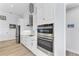 Elegant kitchen with modern appliances, custom cabinetry, and stylish lighting at 630 Coronado Dr, Punta Gorda, FL 33950