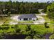 Aerial view of a single-Gathering home under construction at 2502 Pinewood St, North Port, FL 34288