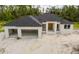 Aerial view of a new construction home with a large lot at 2502 Pinewood St, North Port, FL 34288