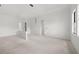 Open concept kitchen with island and access to other rooms at 2502 Pinewood St, North Port, FL 34288
