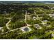 Aerial view showcasing a home's location in a residential neighborhood at 2502 Pinewood St, North Port, FL 34288
