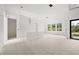 Modern kitchen featuring an island and ample natural light at 2502 Pinewood St, North Port, FL 34288