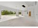 Large unfinished three-car garage with open views at 2502 Pinewood St, North Port, FL 34288