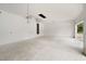 Spacious unfinished garage with an additional door at 2502 Pinewood St, North Port, FL 34288