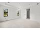Bright bedroom with two windows and plenty of space at 2502 Pinewood St, North Port, FL 34288
