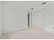 Spacious bedroom with large windows and unfinished flooring at 2502 Pinewood St, North Port, FL 34288