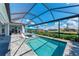 Spacious screened pool and patio with canal view at 630 Coronado Dr, Punta Gorda, FL 33950