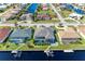 Aerial view of canal front property showcasing two houses with private pools at 630 Coronado Dr, Punta Gorda, FL 33950
