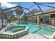 Large screened pool and spa with plenty of space for relaxation at 2208 Barksdale St, Port Charlotte, FL 33948