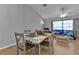 Dining area with four chairs and a view of living room at 2208 Barksdale St, Port Charlotte, FL 33948