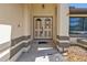 Inviting front entrance with double doors and a covered entryway at 2208 Barksdale St, Port Charlotte, FL 33948