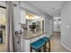 Kitchen island with seating overlooking the living room and entryway at 2208 Barksdale St, Port Charlotte, FL 33948
