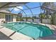 Escape to your own private oasis with this screened pool and spa at 2208 Barksdale St, Port Charlotte, FL 33948