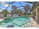 Inviting screened pool and spa with lounge chairs; perfect for relaxation at 2208 Barksdale St, Port Charlotte, FL 33948