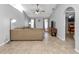 Relaxing living room with vaulted ceilings, tile flooring, and large sectional sofa at 2208 Barksdale St, Port Charlotte, FL 33948