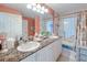 Double vanity bathroom with marble countertop at 3228 Purple Martin Dr # 113, Punta Gorda, FL 33950