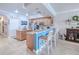 Modern kitchen with granite counters and wood cabinets at 3228 Purple Martin Dr # 113, Punta Gorda, FL 33950