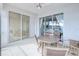 Spacious lanai with sliding doors offering scenic waterfront views at 3228 Purple Martin Dr # 113, Punta Gorda, FL 33950