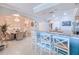 Kitchen with breakfast bar, granite countertop, and wicker dining chairs at 3228 Purple Martin Dr # 113, Punta Gorda, FL 33950