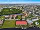 Aerial view showcasing a condo building near the waterfront in a residential area at 3228 Purple Martin Dr # 113, Punta Gorda, FL 33950