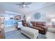 Open living room with kitchen island view and seating area at 3228 Purple Martin Dr # 113, Punta Gorda, FL 33950