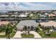 Property view from above, showing house and canal at 2185 Via Esplanade, Punta Gorda, FL 33950