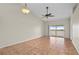 Spacious living room with tile floor and sliding doors to balcony at 1512 Rio De Janeiro Ave # 327, Punta Gorda, FL 33983