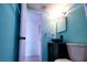 Bathroom with updated vanity and toilet at 8362 Osprey Rd, Englewood, FL 34224