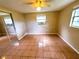 Spacious bedroom featuring tile floors and mirrored closet at 8362 Osprey Rd, Englewood, FL 34224