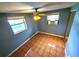 Bedroom with tile floors, window, and air conditioner at 8362 Osprey Rd, Englewood, FL 34224