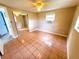 Simple bedroom with tile floors and mirrored closet at 8362 Osprey Rd, Englewood, FL 34224