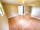 Well-lit bedroom, tile floors and mirrored closet doors at 8362 Osprey Rd, Englewood, FL 34224