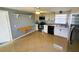 Updated kitchen features stainless steel appliances and light cabinetry at 8362 Osprey Rd, Englewood, FL 34224