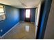 Laundry room with exterior access and tile floor at 8362 Osprey Rd, Englewood, FL 34224