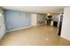 Bright living room with tile flooring and access to kitchen at 8362 Osprey Rd, Englewood, FL 34224