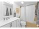 Clean bathroom with white vanity and tub shower at 1352 Rock Dove Ct # B204, Punta Gorda, FL 33950