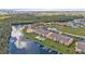 Aerial view of a waterfront condo community with a pool and boat slips at 1352 Rock Dove Ct # B204, Punta Gorda, FL 33950
