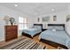 Guest bedroom with two twin beds and light decor at 1352 Rock Dove Ct # B204, Punta Gorda, FL 33950