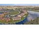 Aerial view of waterfront property with community pool and boat docks at 1352 Rock Dove Ct # B204, Punta Gorda, FL 33950
