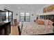 Main bedroom with king-size bed and water views at 1352 Rock Dove Ct # B204, Punta Gorda, FL 33950