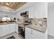 Updated kitchen with granite countertops and stainless steel appliances at 1352 Rock Dove Ct # B204, Punta Gorda, FL 33950